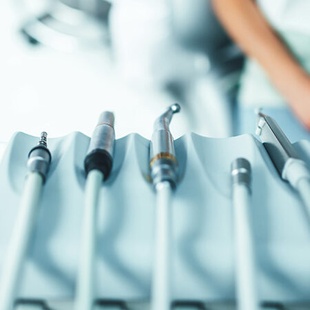 Dental instruments closeup on the dental chair